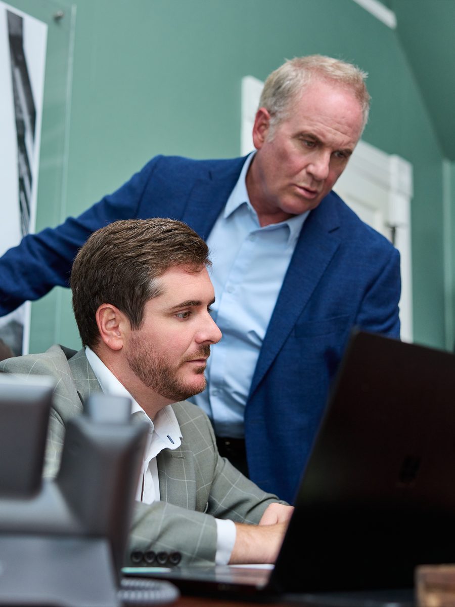 James Barnes working through a case with his son Mason at the firm’s Pensacola office